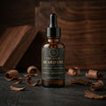 Bottle of premium beard oil with a wooden background