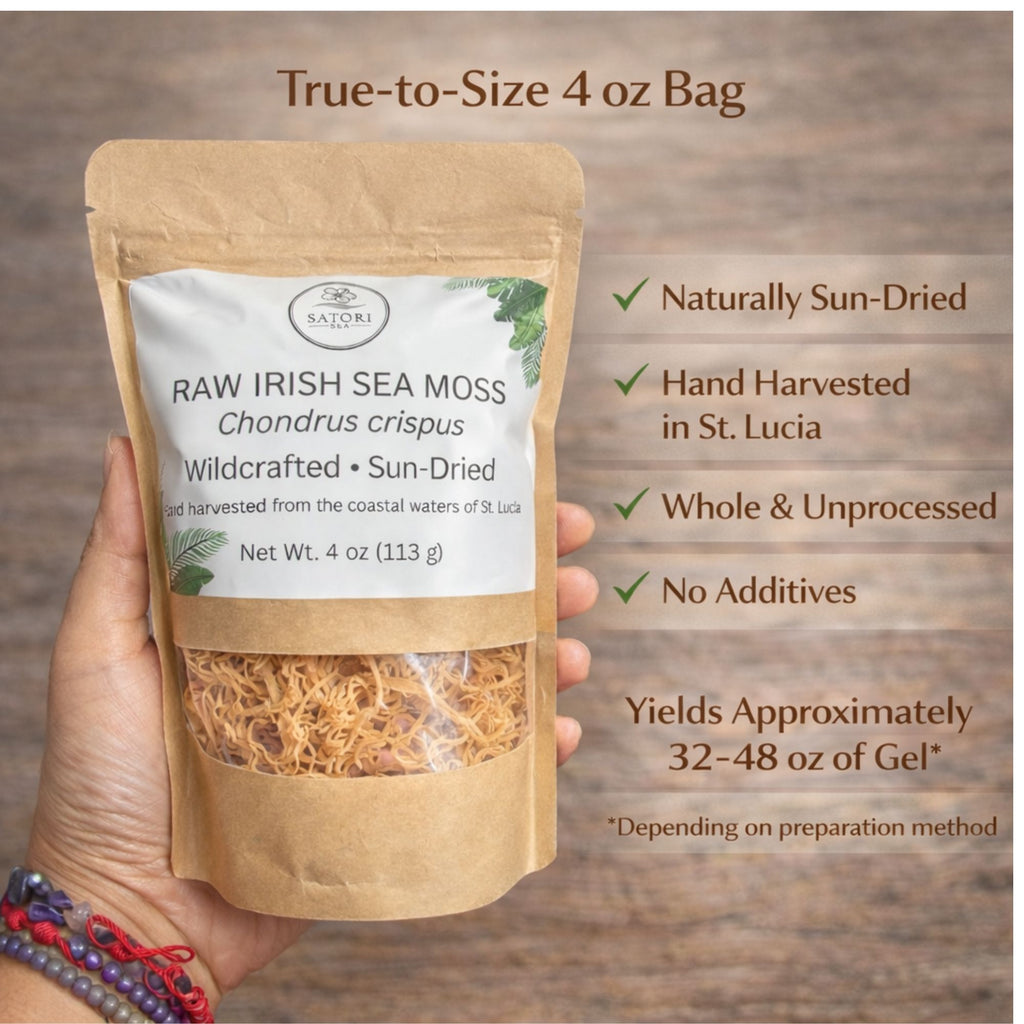 Hand holding a package of raw Irish sea moss with product details on a wooden background